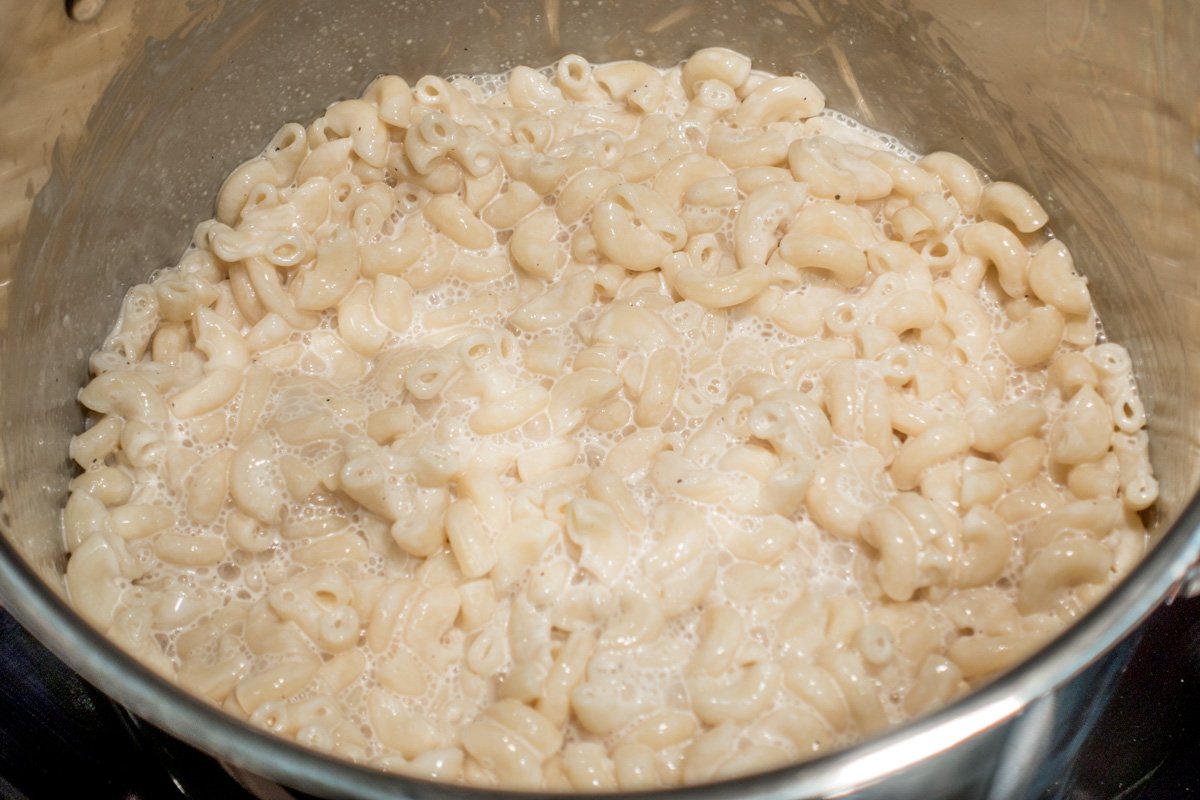 Coat the pasta with macaroni salad dressing