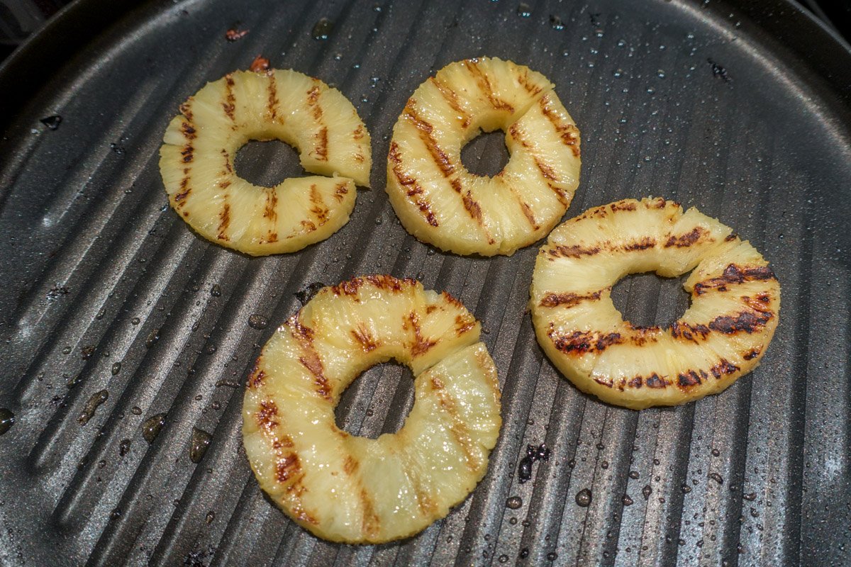 Grilled pineapples are a highlight of this Hawaiian barbecue chicken recipe