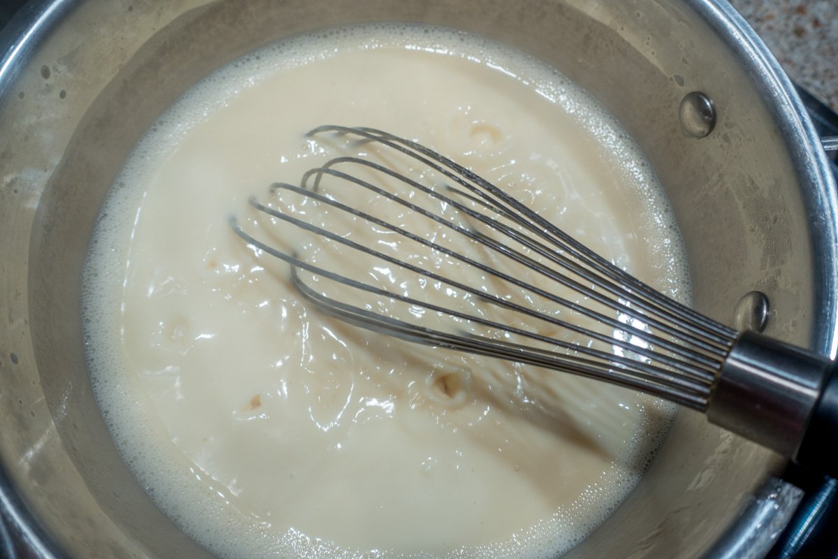 Whisking and keeping the ingredients of low-to-medium heat is an important part of a vanilla pudding recipe