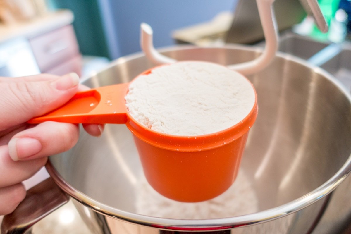 Lightly fill the cup with bread flour and level with a knife