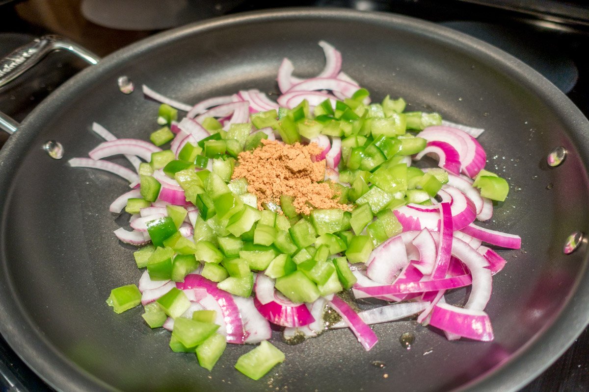 Sautee the fresh vegetables for this Mexican quinoa bake vegetarian