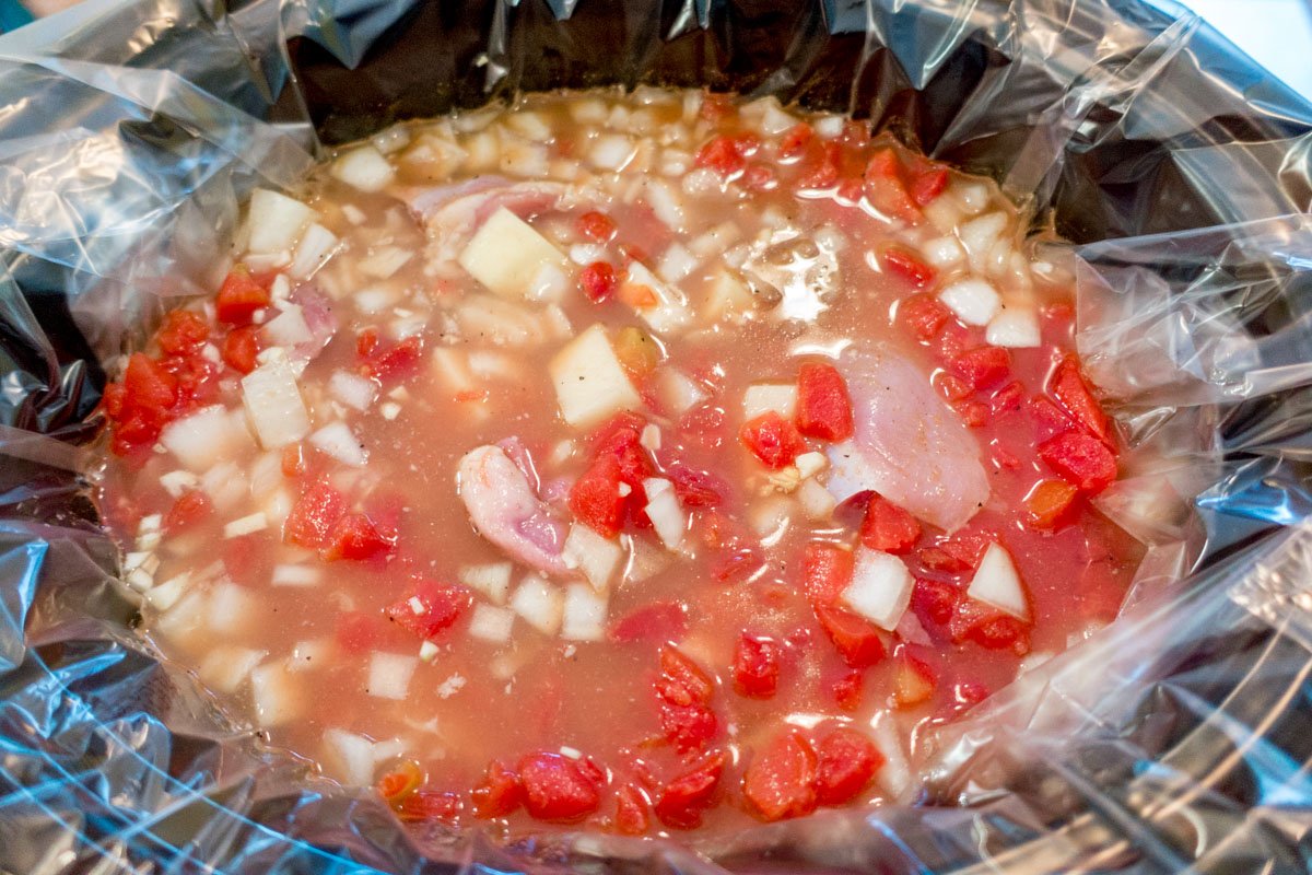 Add the broth, tomatoes, and chicken to the curry lentils