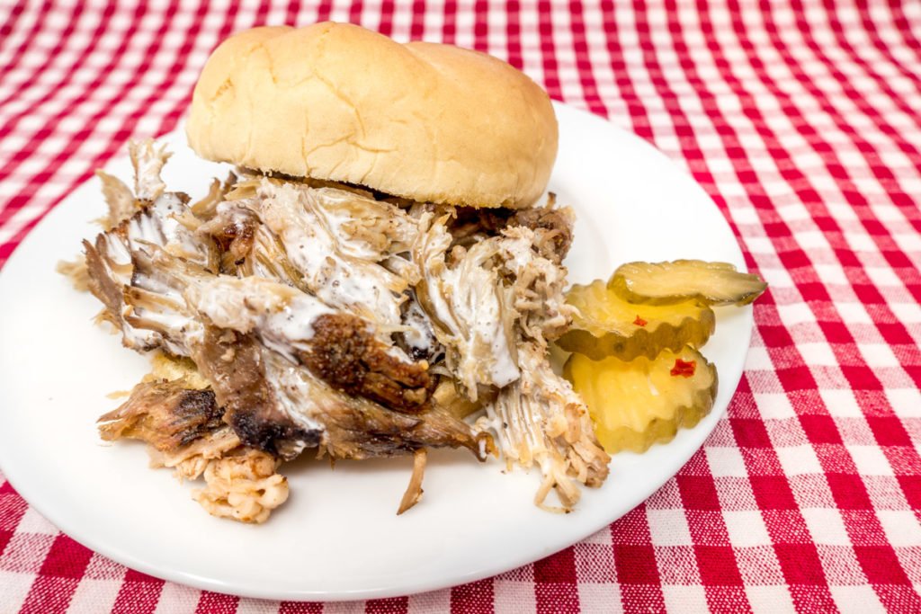 Pulled pork with Alabama white BBQ sauce is a delicious choice for lunch or dinner year-round
