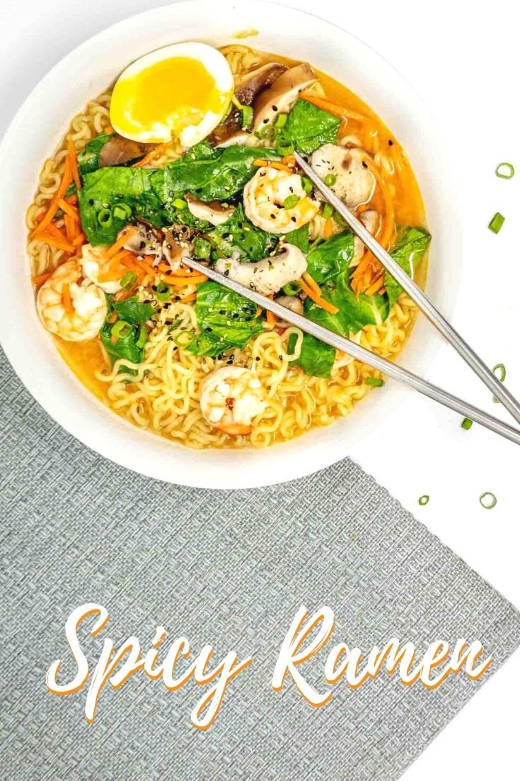 Bowl of spicy ramen noodles with shrimp and soft-boiled egg