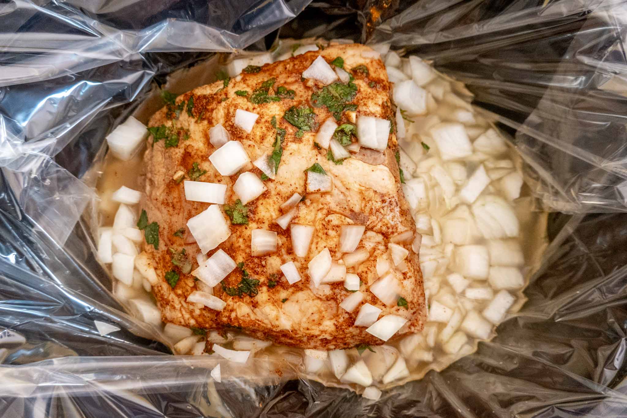 Ingredients for cilantro lime pork in a slow cooker