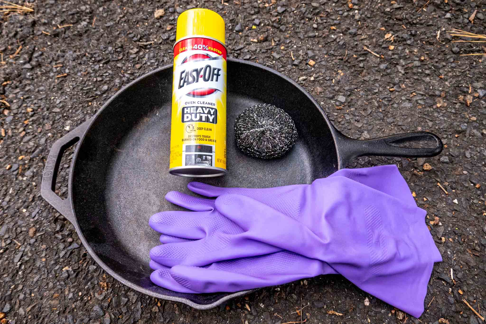 Rubber gloves, steel wool, Easy-Off in cast iron pan